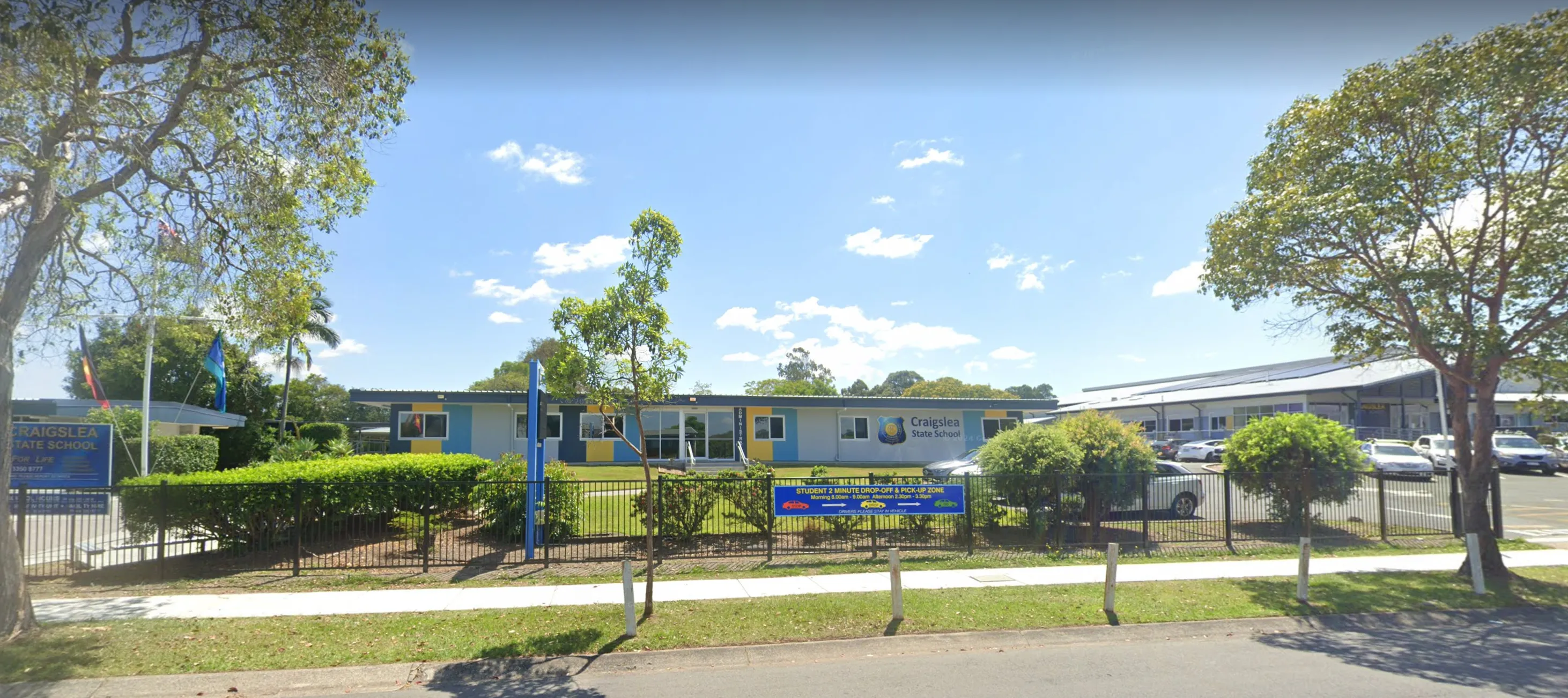 Single-storey Craigslea State School building behind the front fence