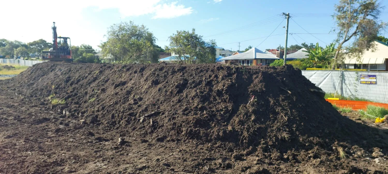 Stockpile of excavated contaminated soil on a remediation site